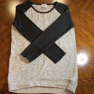 Black, white, and gray long sleeved shirt